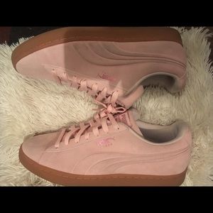 pink and brown pumas
